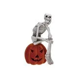 Resin Skeleton sitting on Flocked Jack o Lantern