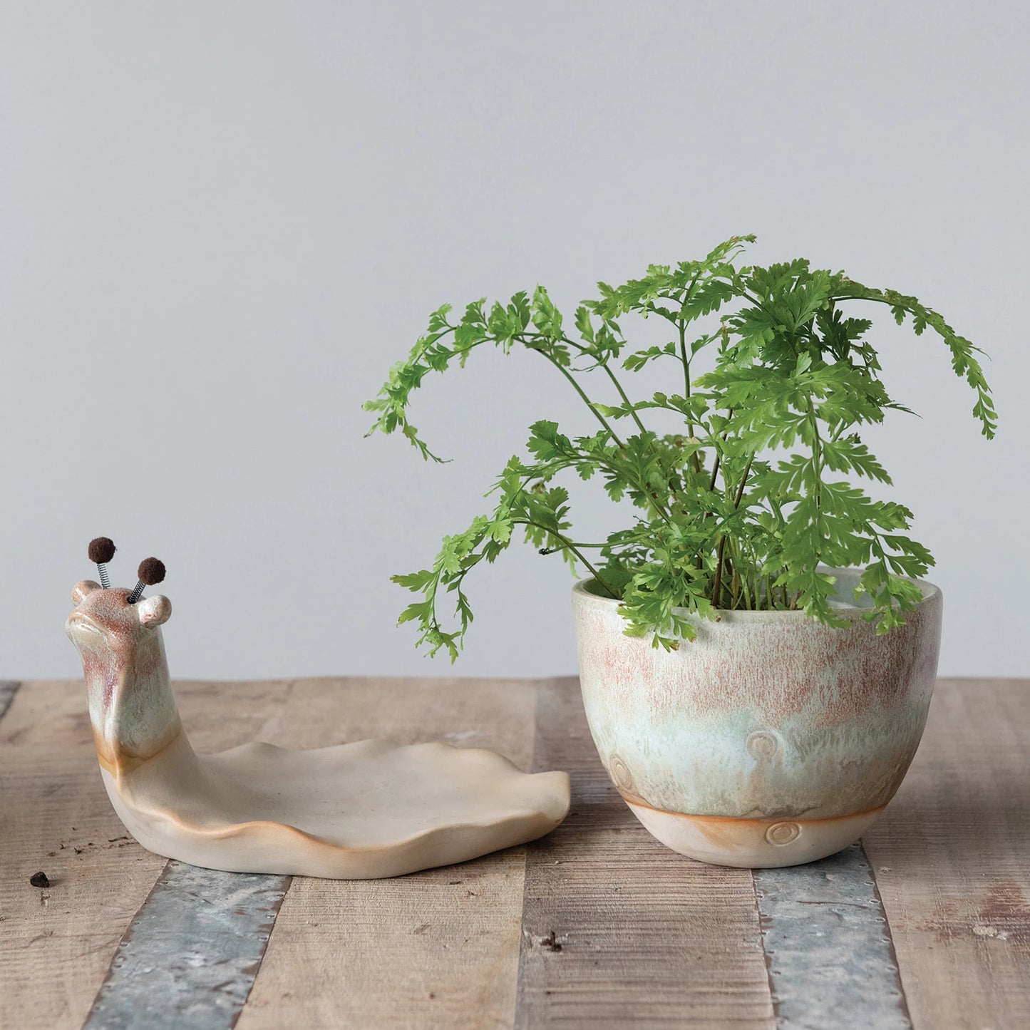 Stoneware snail planter