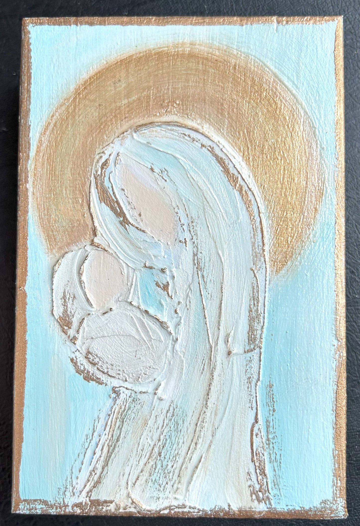 Mary and baby Jesus in gold | Magnificat Christmas Easter