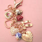 PORCELAIN BOWS HEARTS PEARL STRAWBERRY BAG CHARM | 80K008