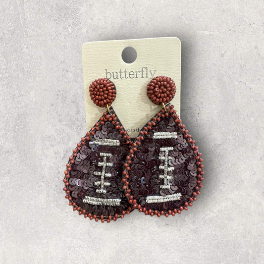 Large football beaded dangle earrings