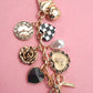 BOW CHECKER HEART FLOWER BAG CHARM | 80K049